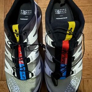 Salomon Black and White Mules with Red and Blue Accents